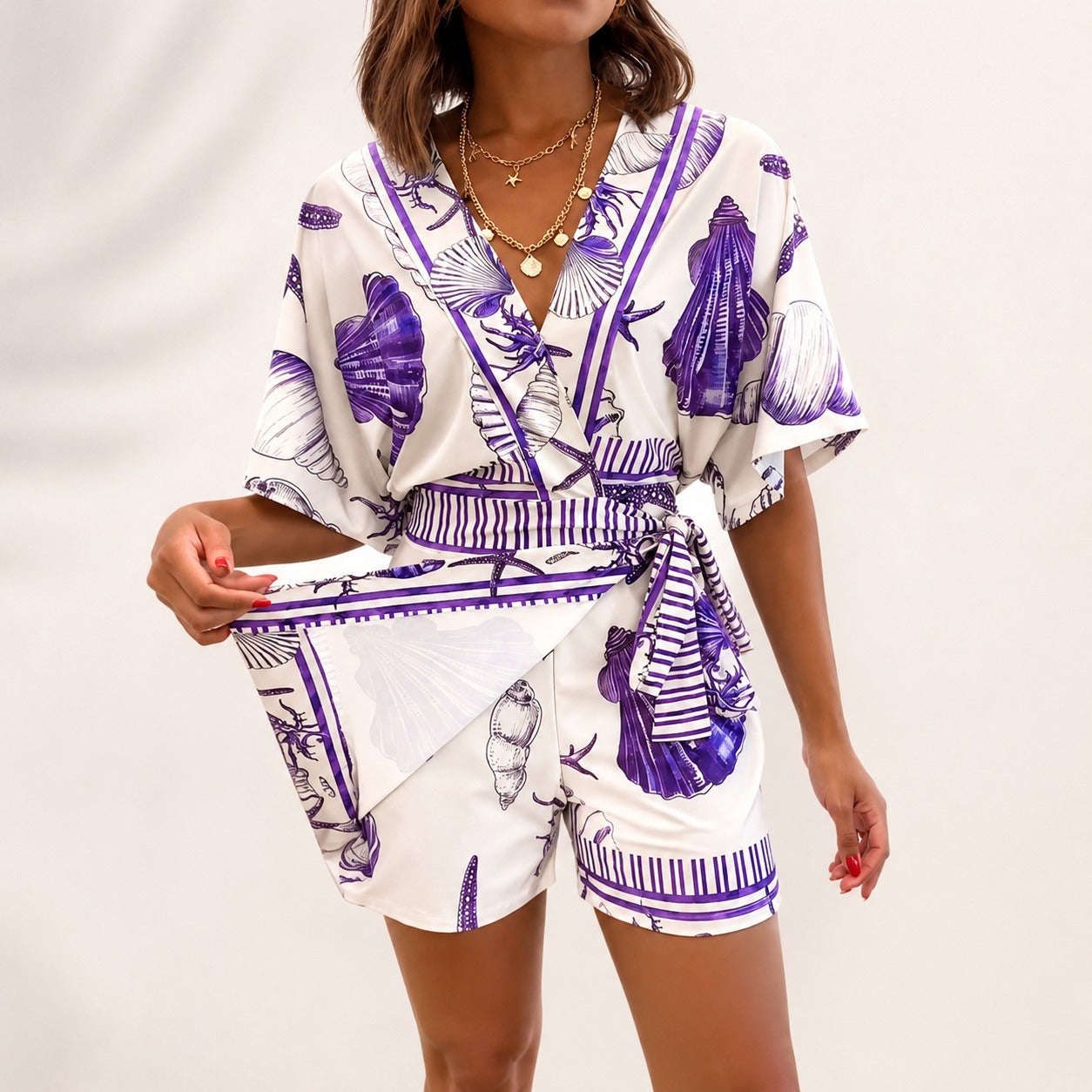 Azzurine™ Romper With Skirt Overlay And Side Tie
